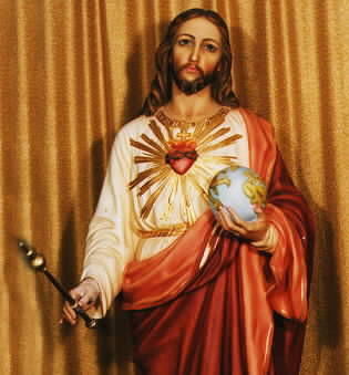 Sacred Heart of Jesus holding a sceptre and the world